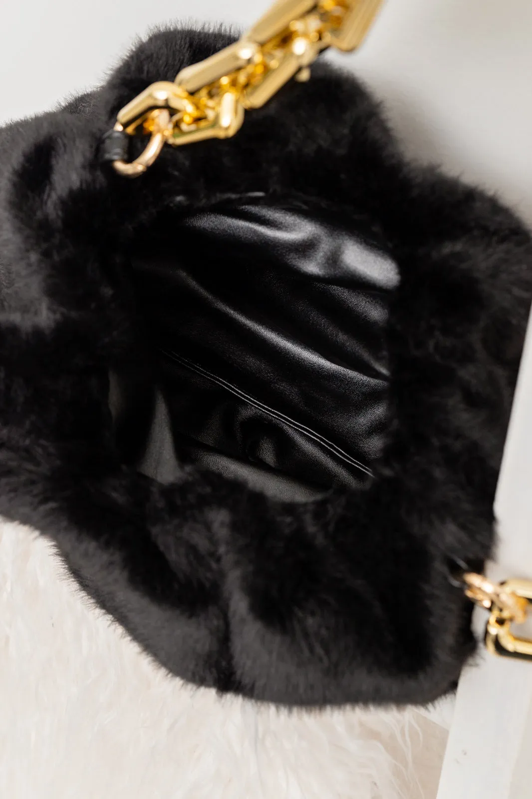 Classy And Carefree Faux Fur Bag In Black - 9/29/2022